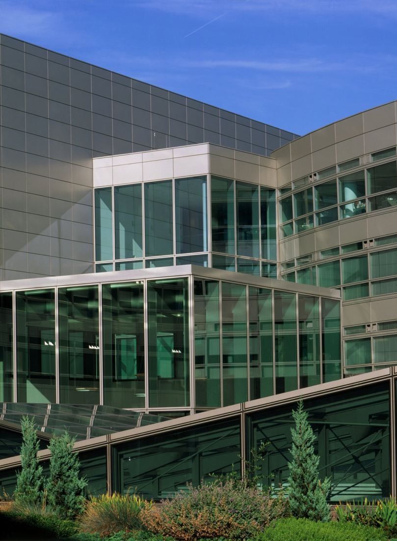 ABN AMRO: Layered glass and metal facades above planted terraces