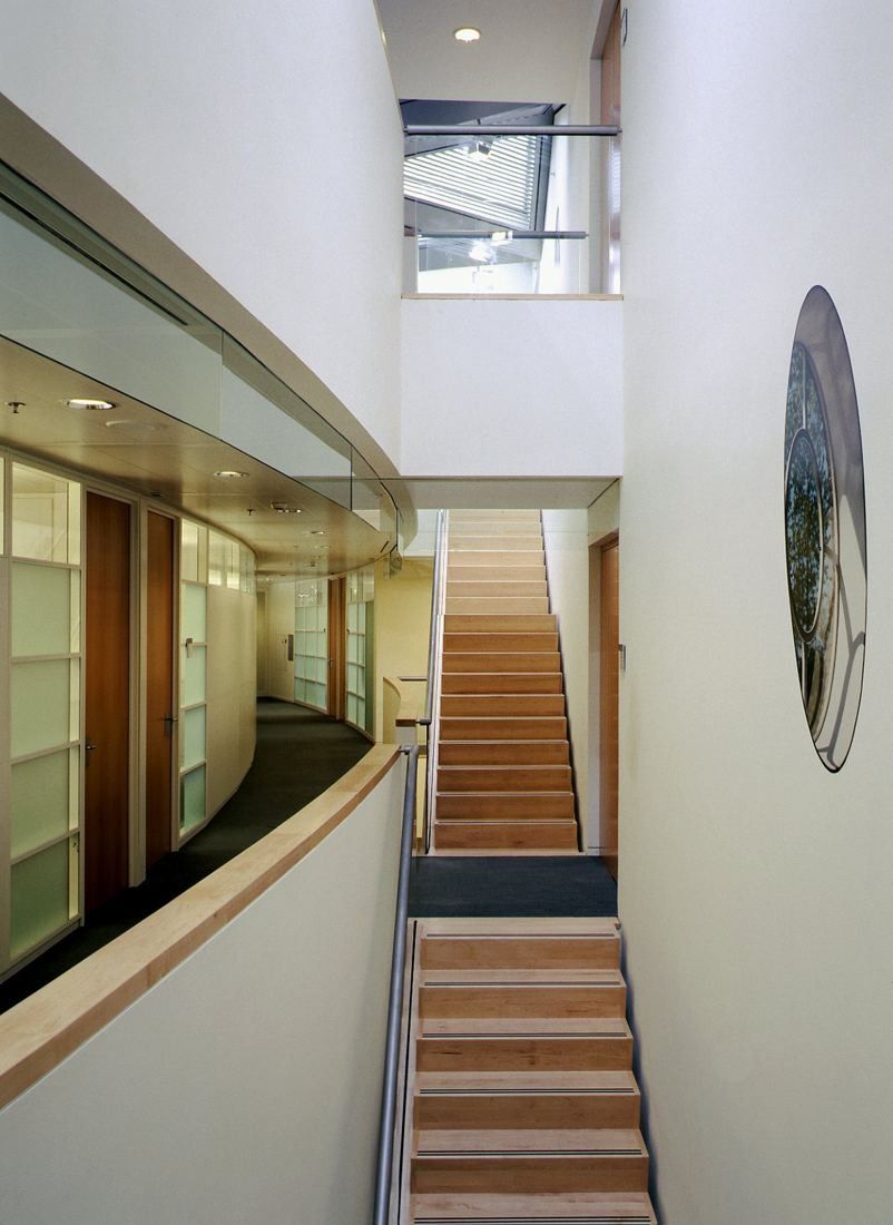 ABN AMRO: Stair and gallery with wooden steps and white walls