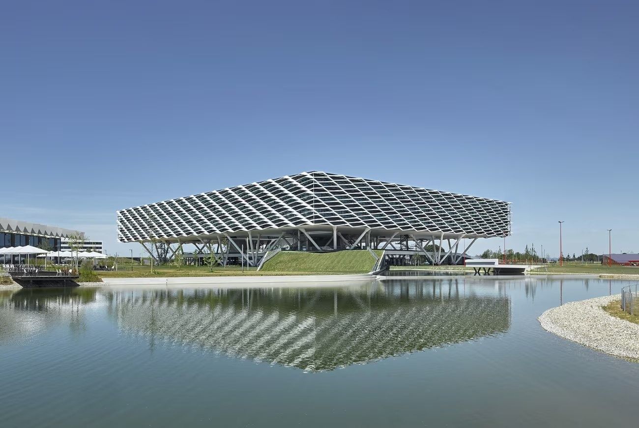 adidas: ARENA reflected in a lake