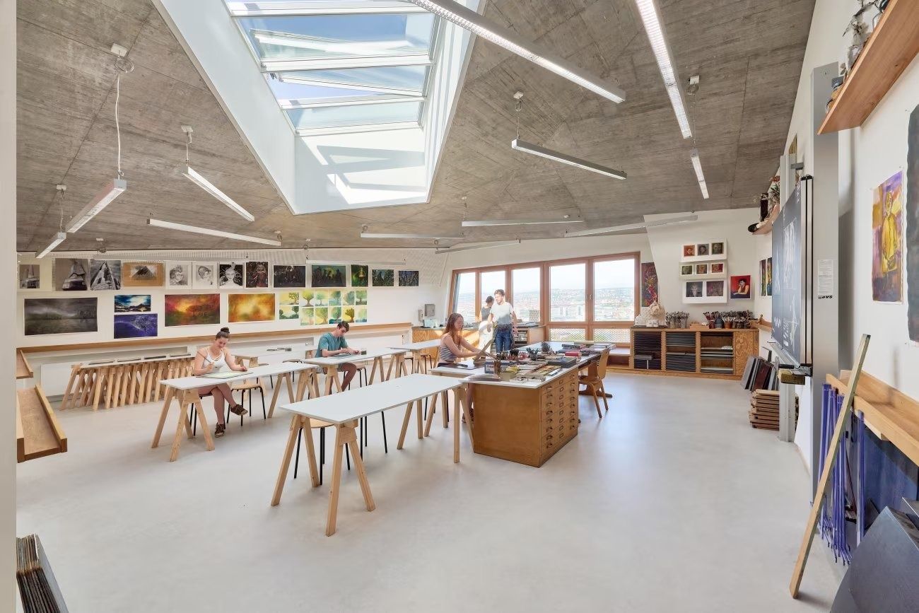 adidas: Skylit design studio with long work tables