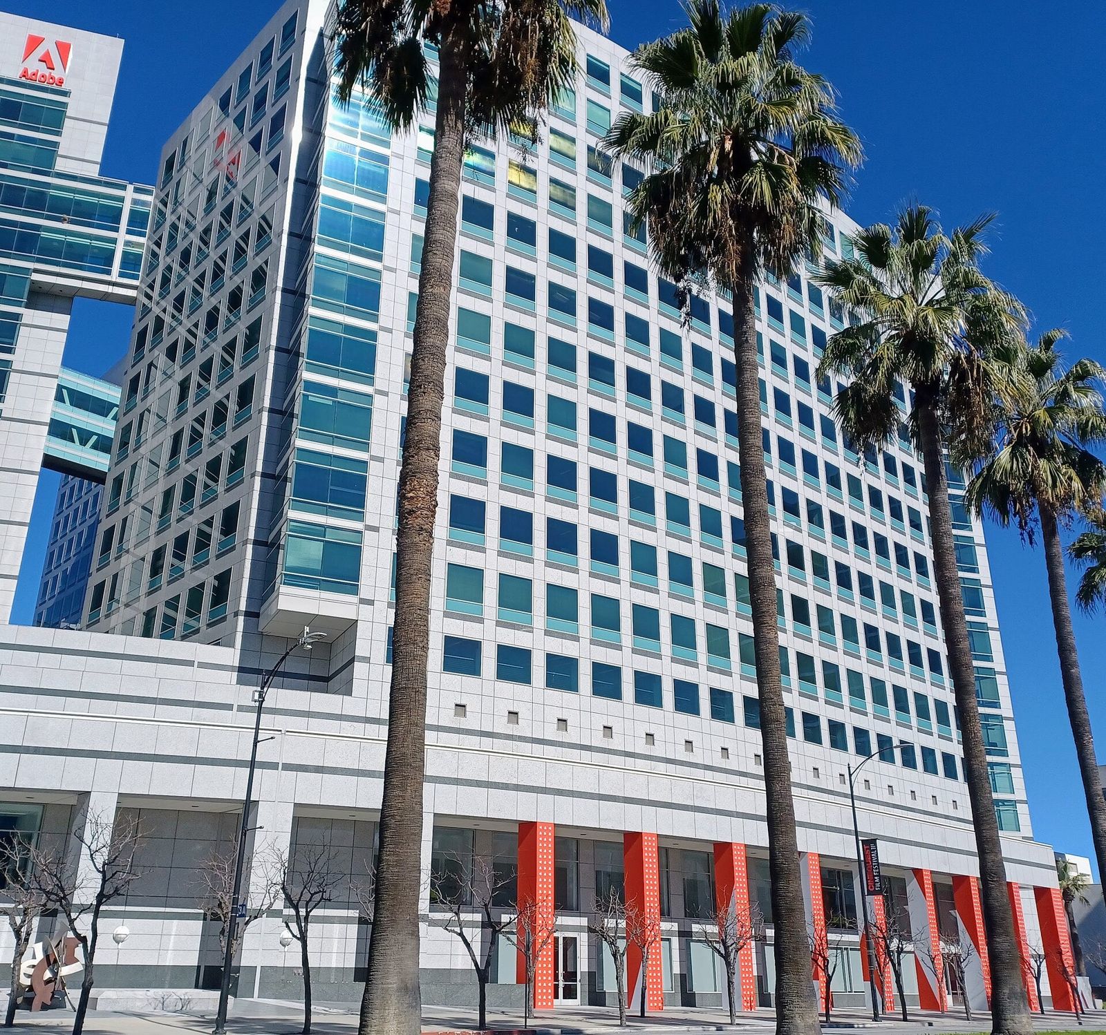 The East Tower behind palm trees