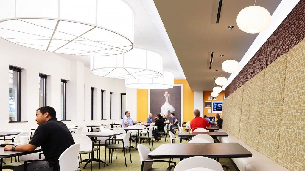 Aflac: A long view through the office with colourful accents