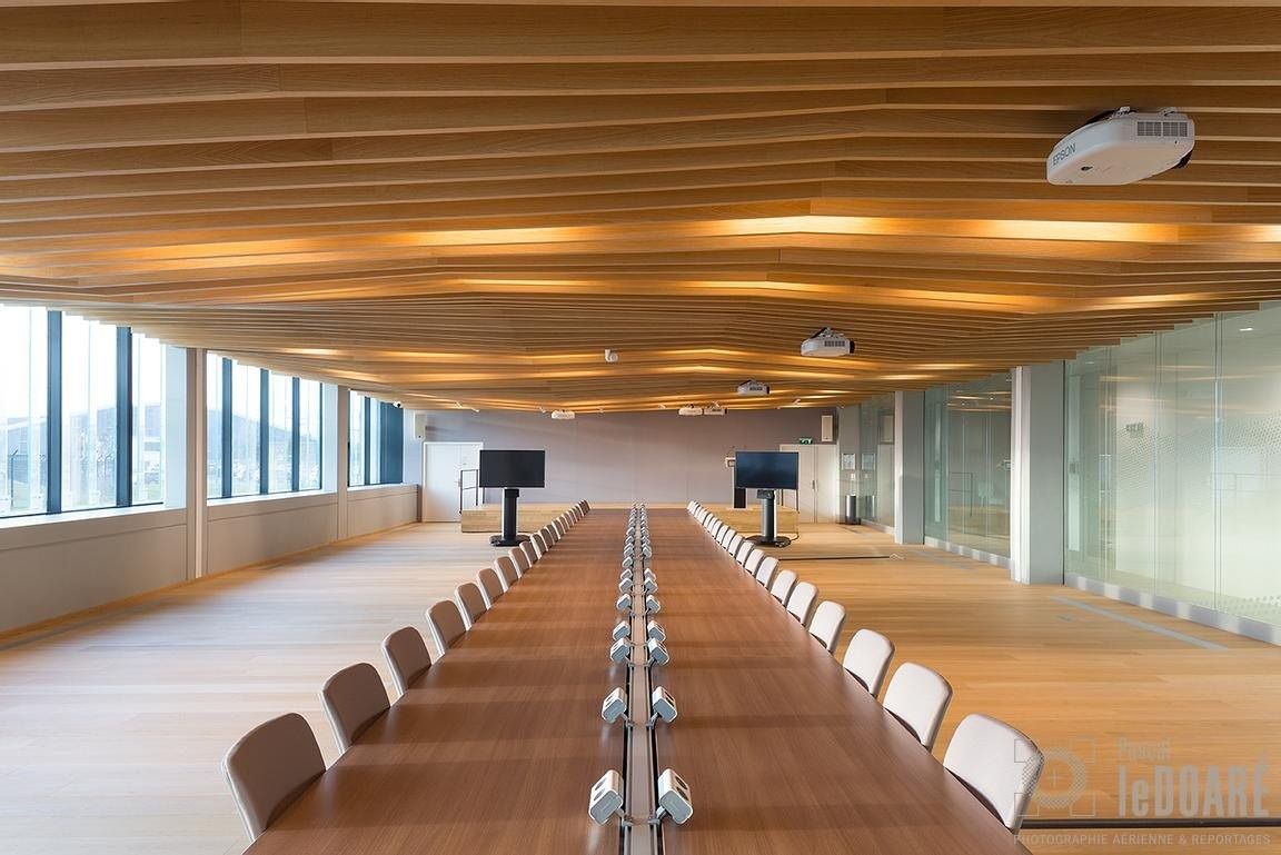 Airbus: Long boardroom table under a timber-slatted ceiling