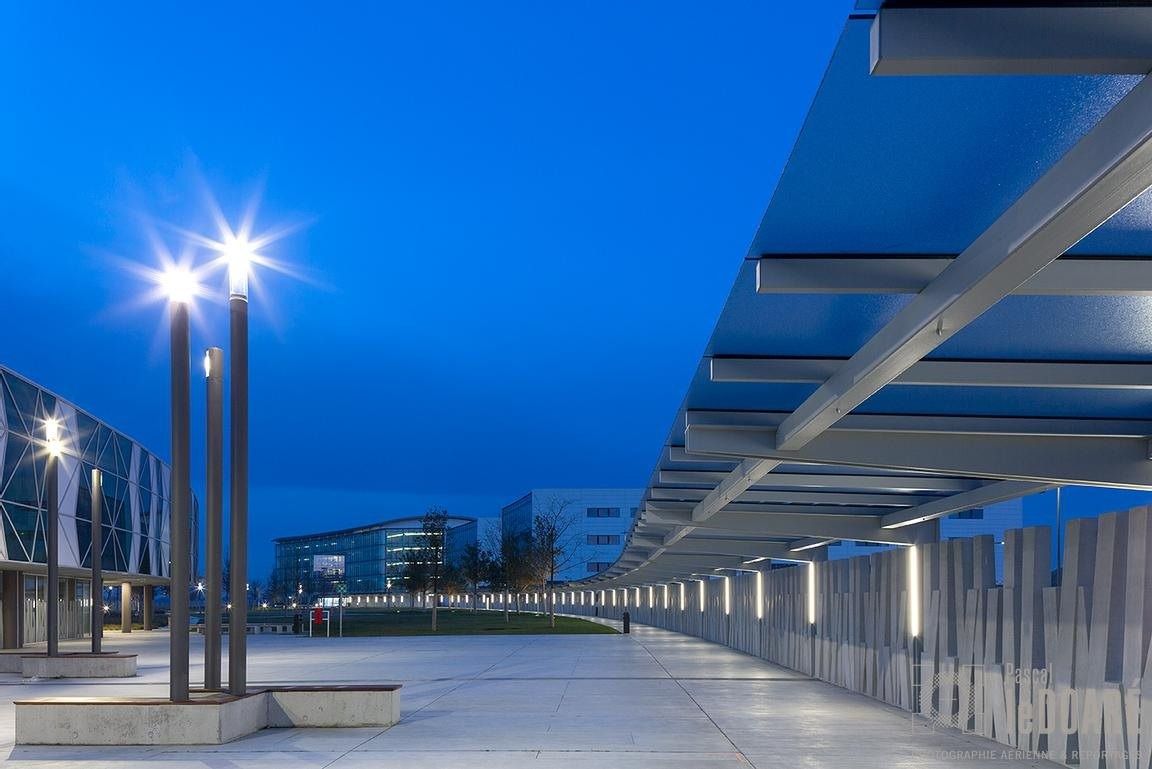 Airbus: Terrace with tall lamps at dusk
