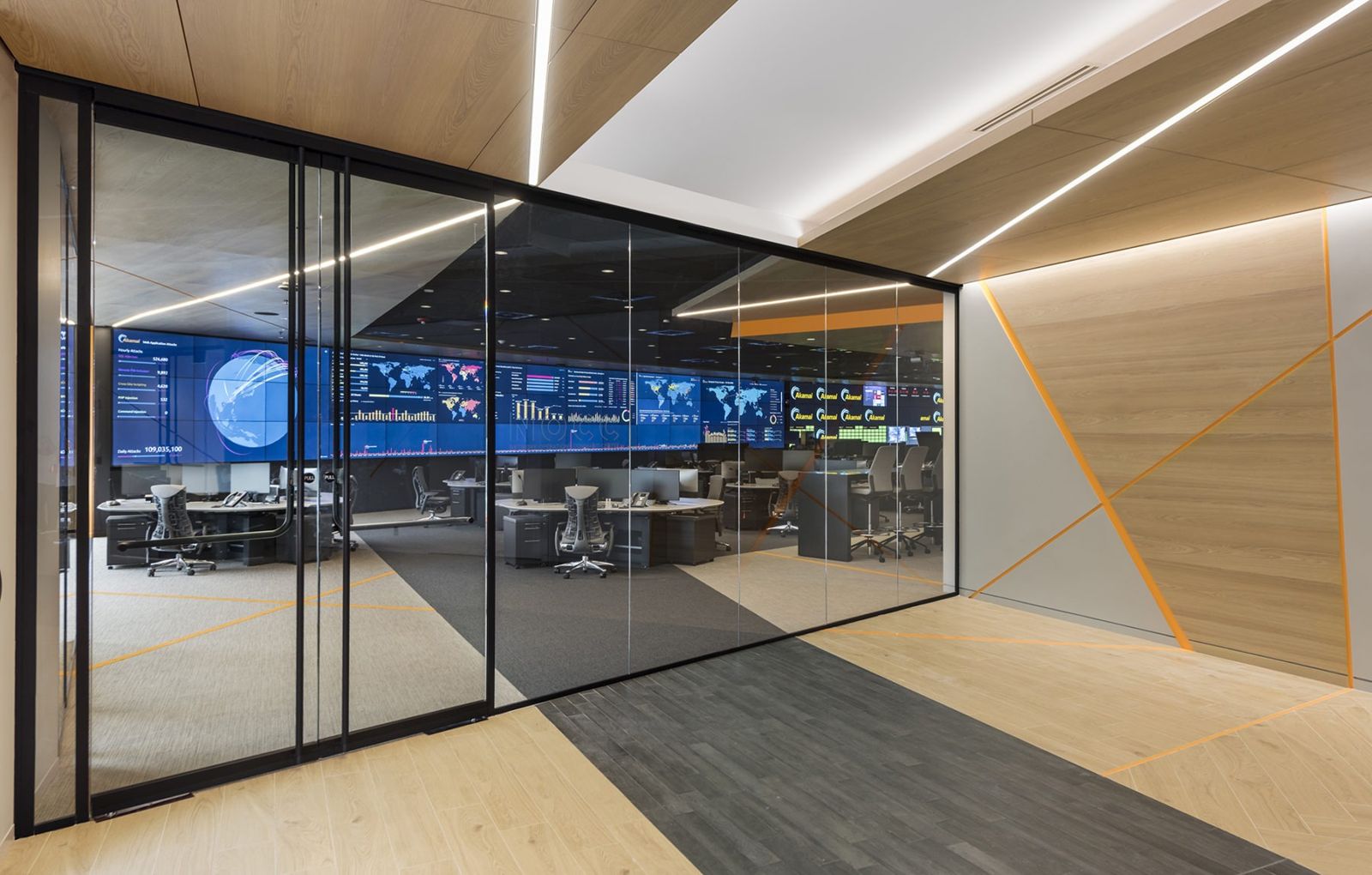 Akamai: Glass wall looking into a room of screens