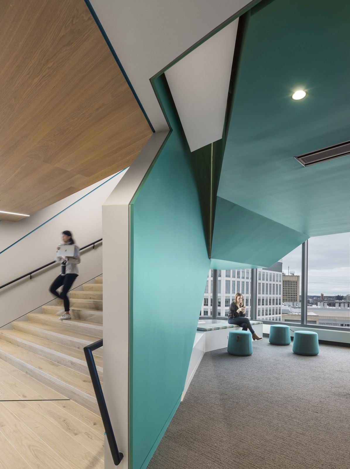 Akamai: Teal angled walls around a stair