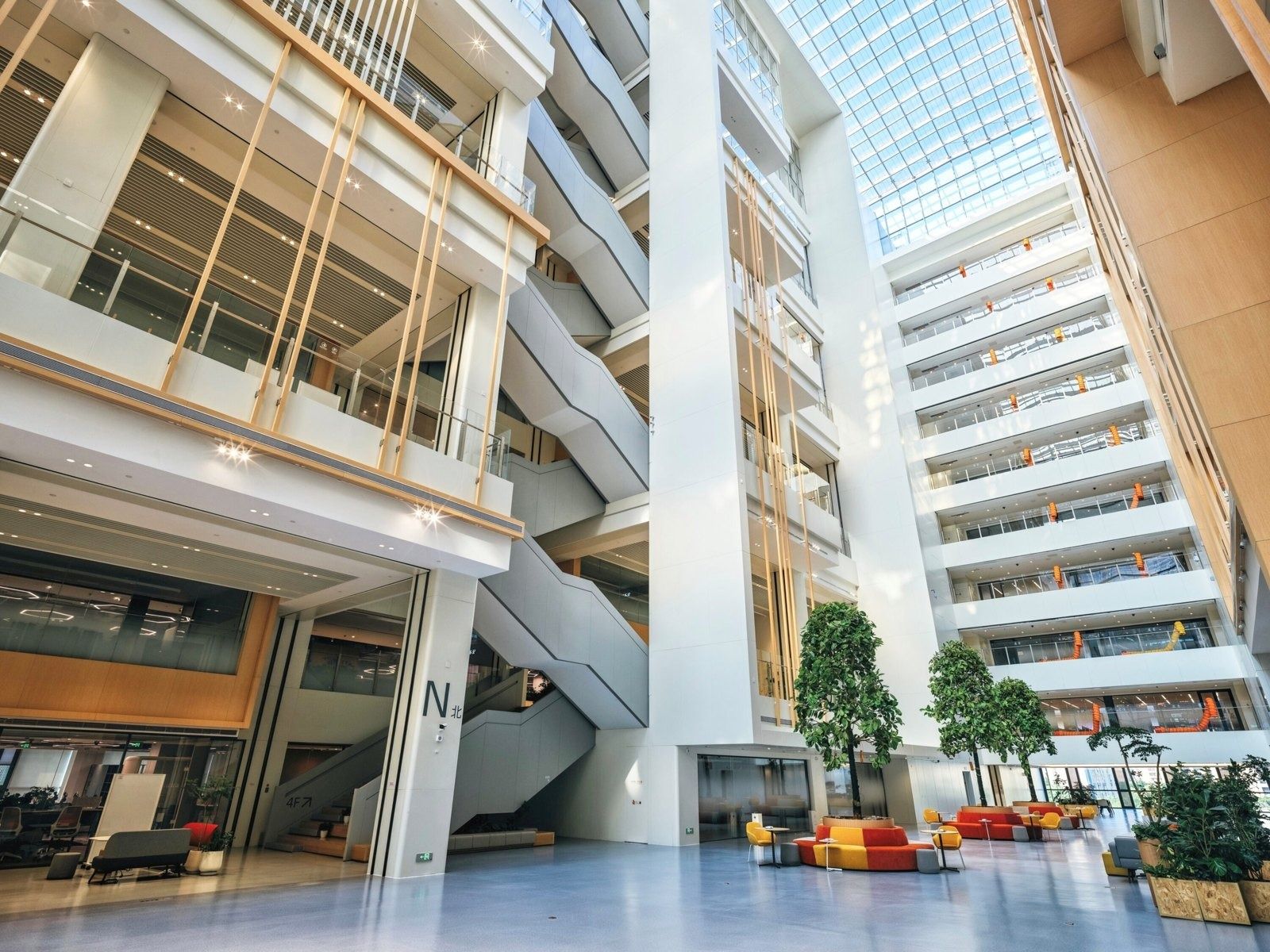Atrium with stairs and orange seating