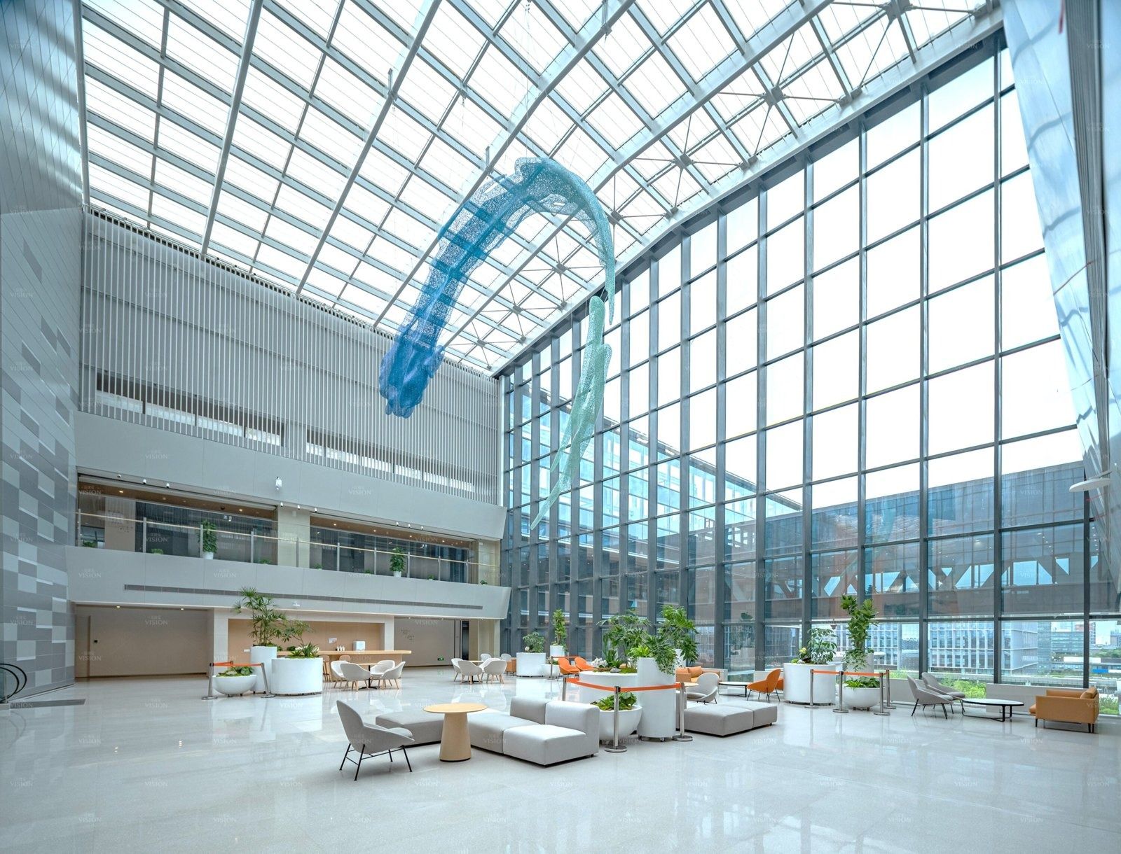 Alibaba Group: Glass-roofed hall with lounge seating