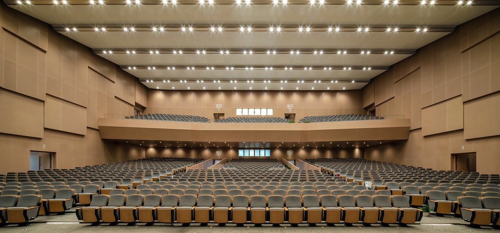 Alibaba Group: Large auditorium with wooden walls
