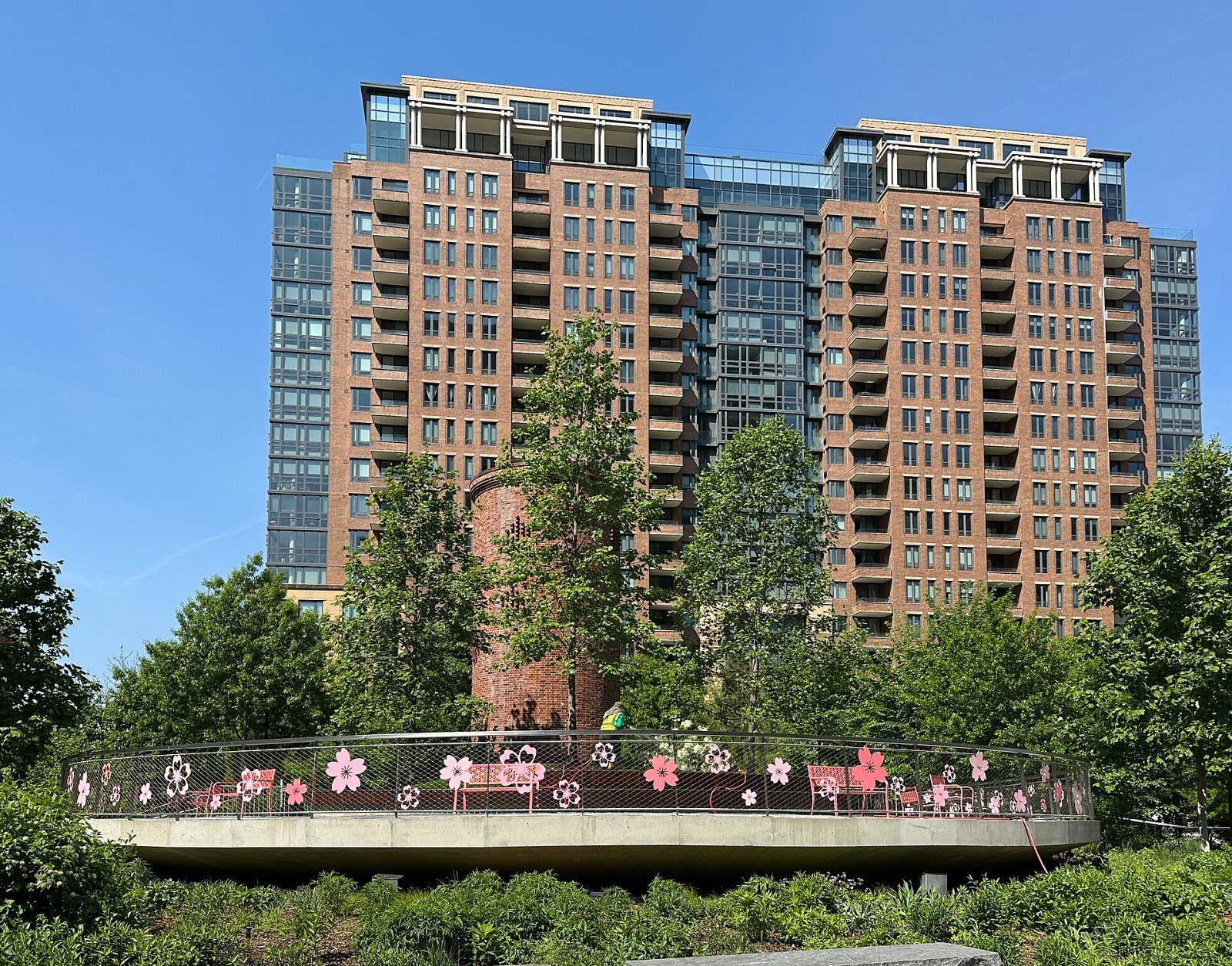 Green park in front of apartment towers
