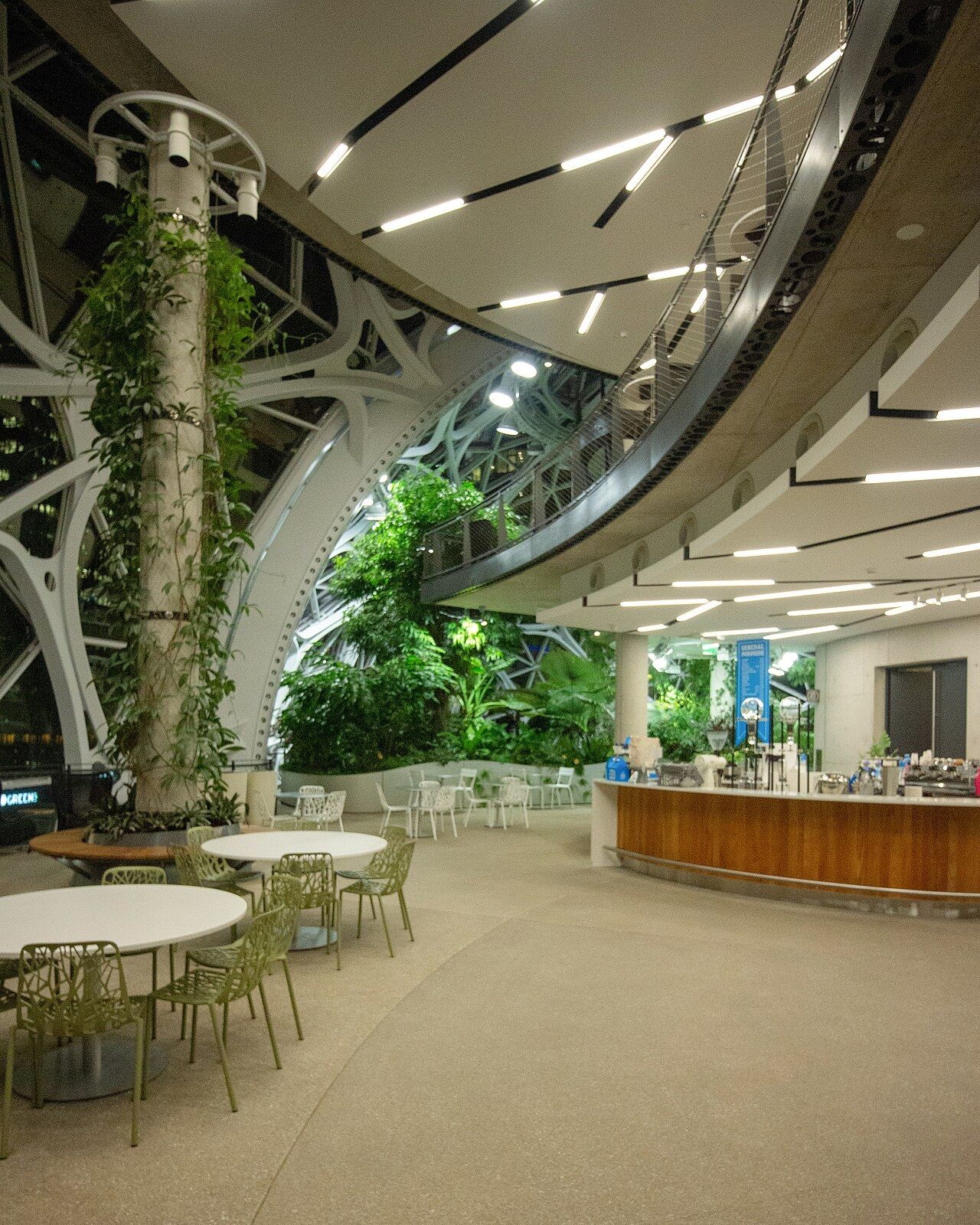 A café counter and tables inside the Spheres