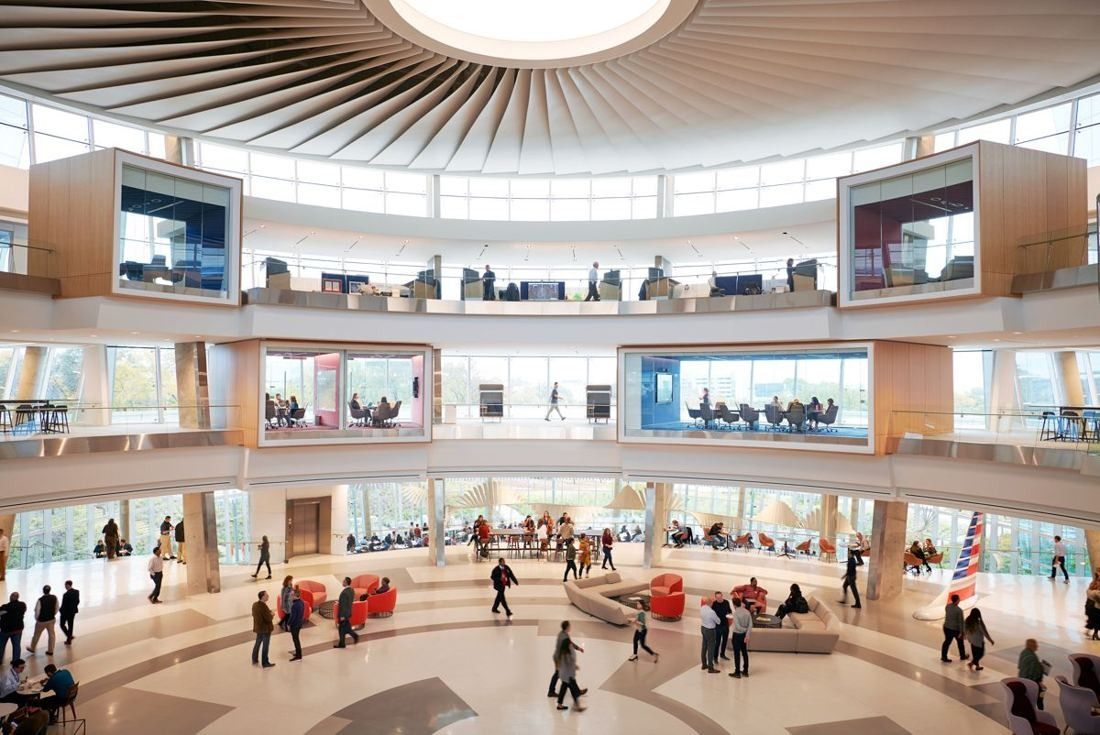 American Airlines: Round multi-storey atrium with a radiating ceiling and glass-fronted rooms around it