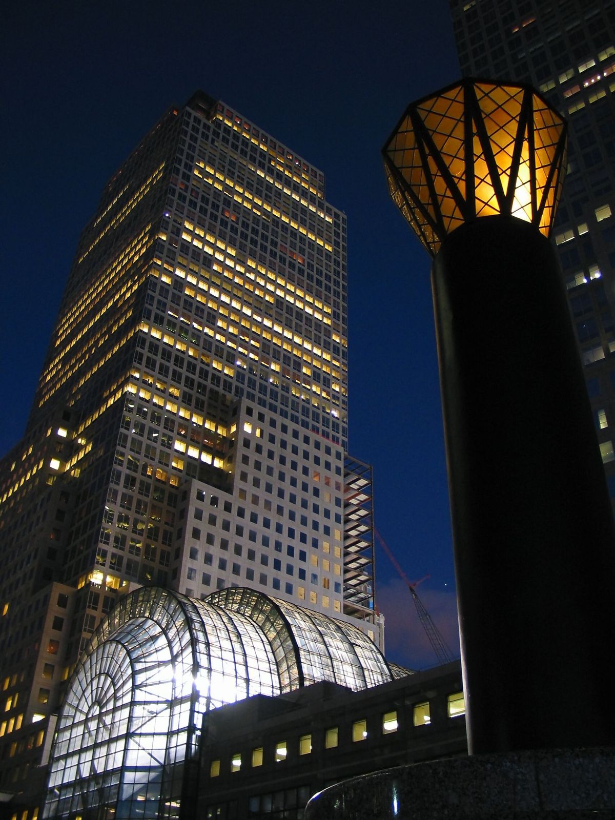 Damaged tower and atrium at night