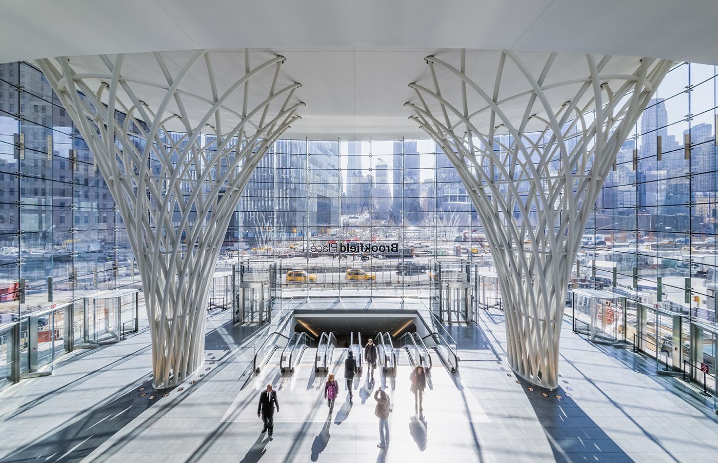 American Express: Glass pavilion with two white branching columns