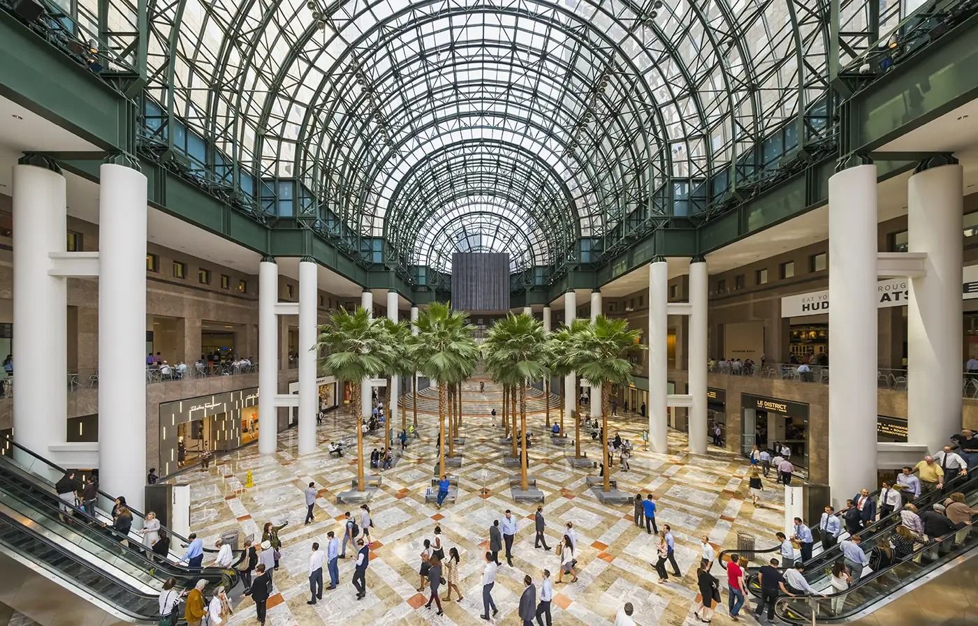 American Express: Glass-vaulted atrium full of visitors