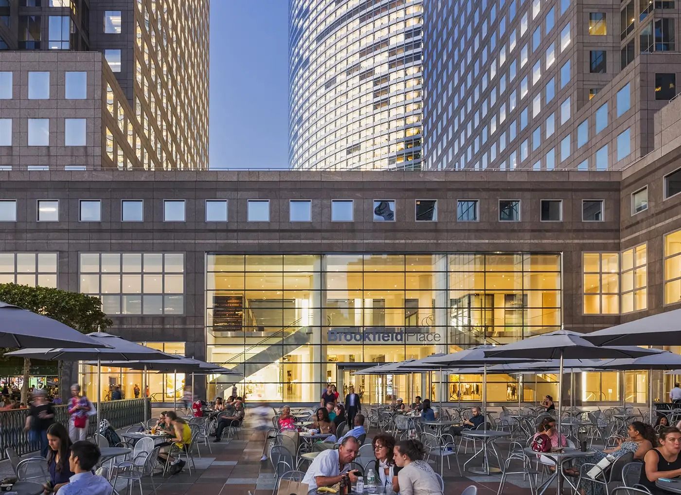 American Express: Outdoor tables in a courtyard between the towers