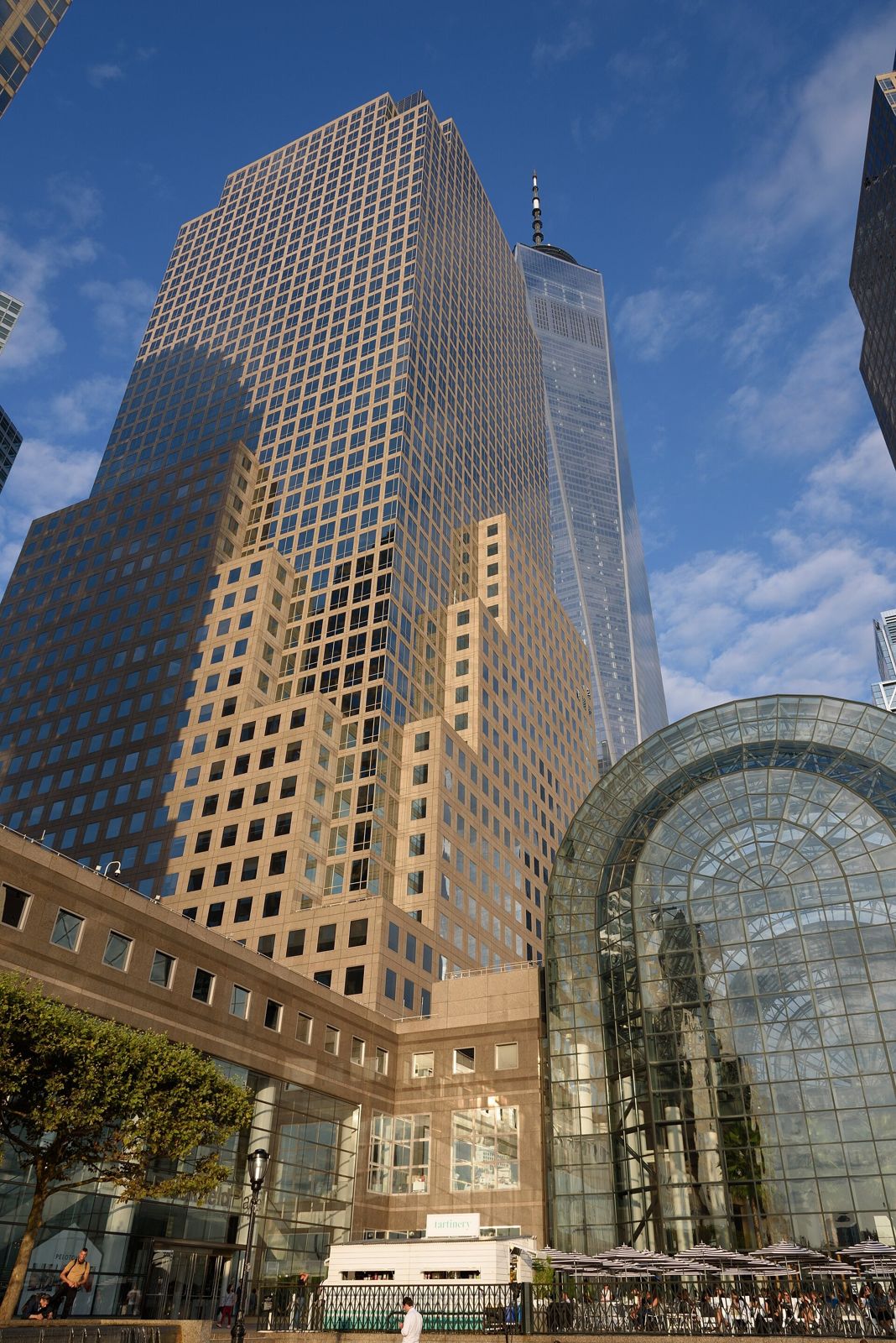 American Express: Tower with a pyramid top beside the glass atrium