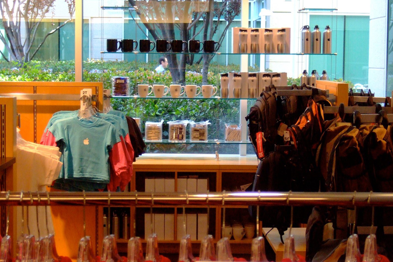 Apple: Store shelves with T-shirts and gifts