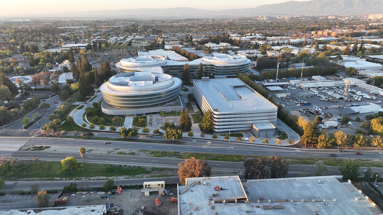 Apple: Aerial view of round and rectangular office buildings