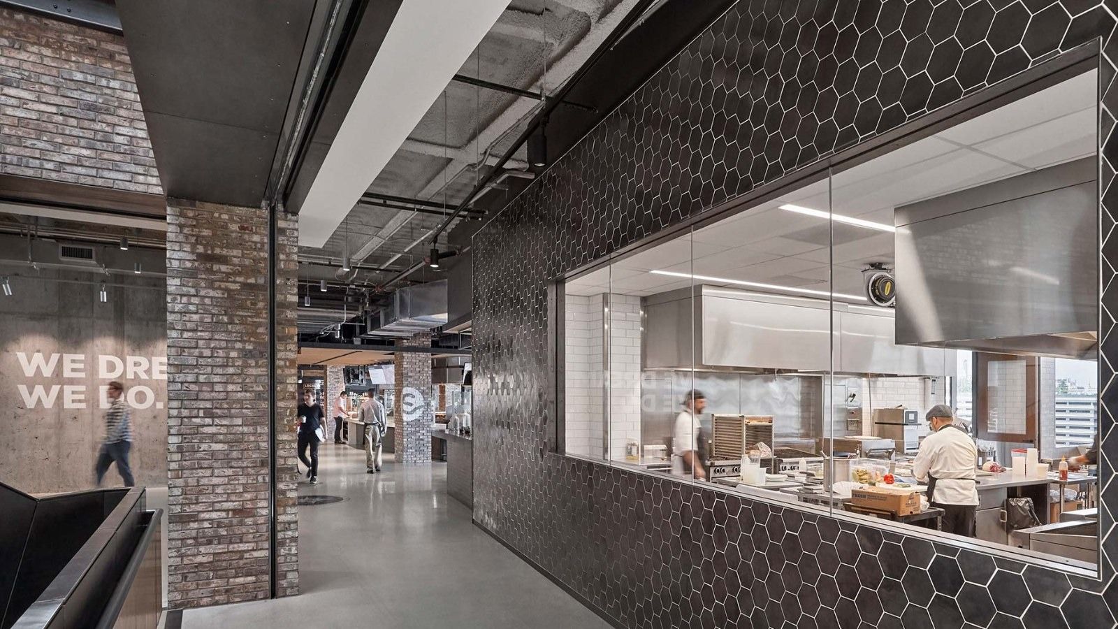 Aramark: A demonstration kitchen seen through a window