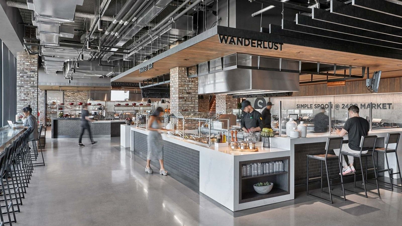 Aramark: A food hall counter with stools
