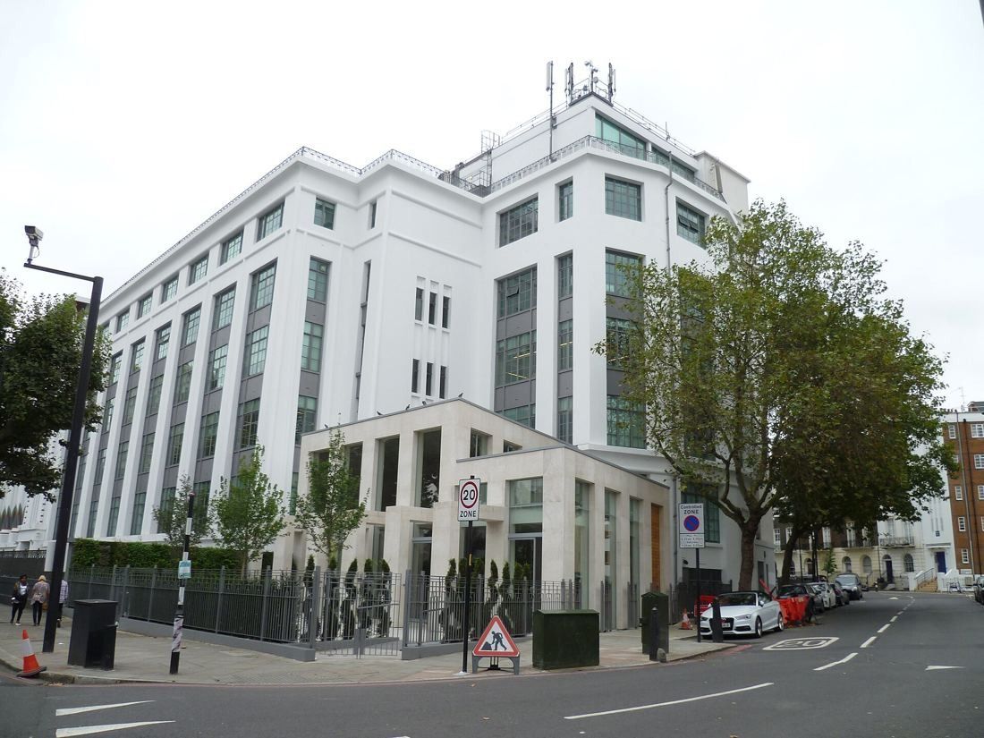 ASOS: Tall white corner block of the building at a road junction