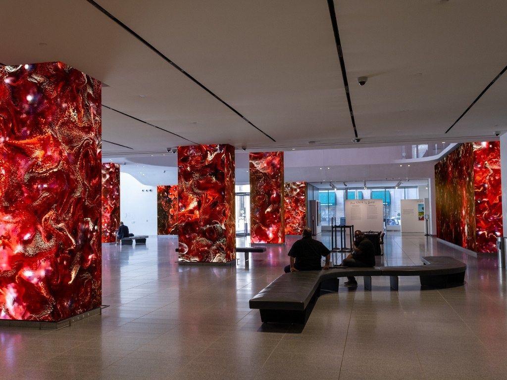 AT&T: Red LED columns in a wide lobby