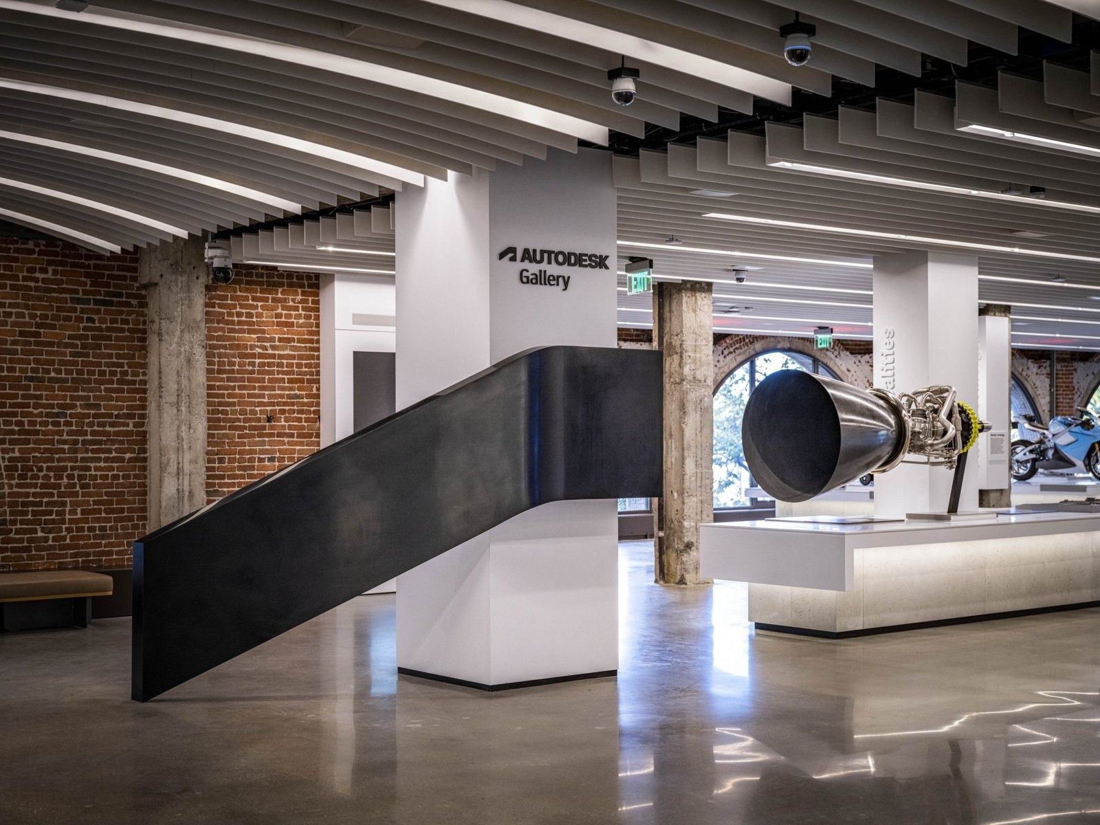 Autodesk: A sculptural display beside an aircraft engine part