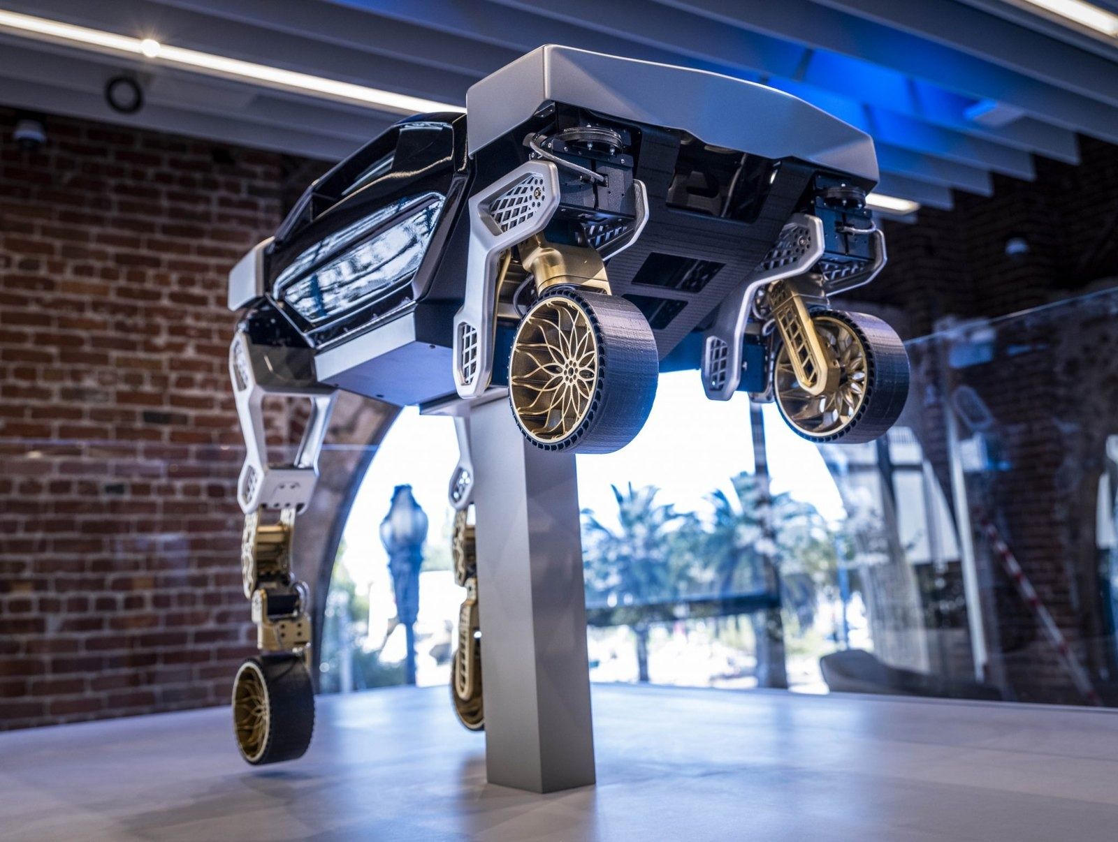 Autodesk: A walking-car prototype displayed in front of an arched window