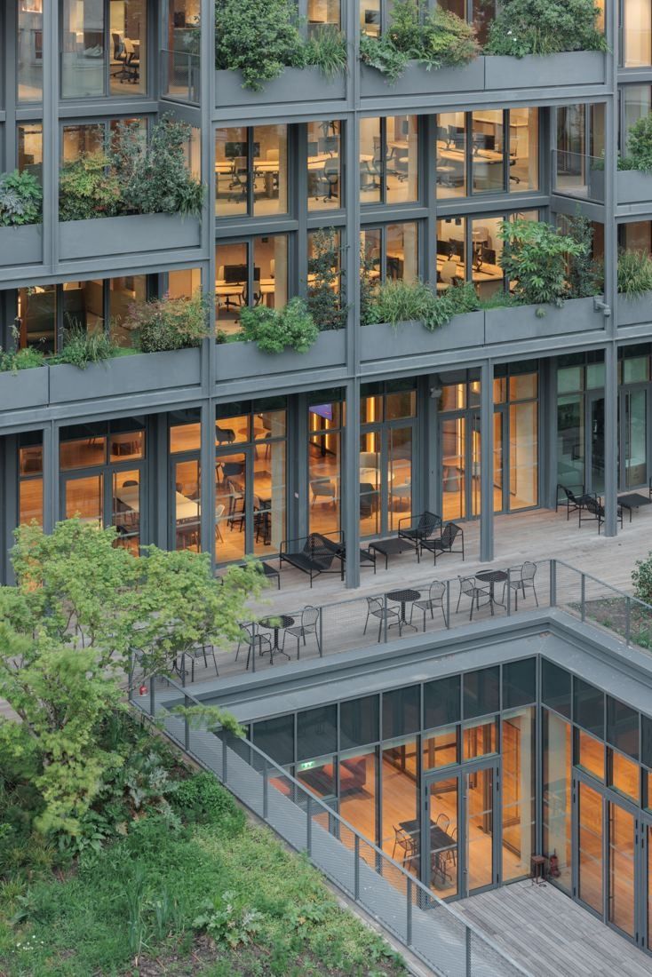 AXA: Planted façade above a sunken glazed restaurant level