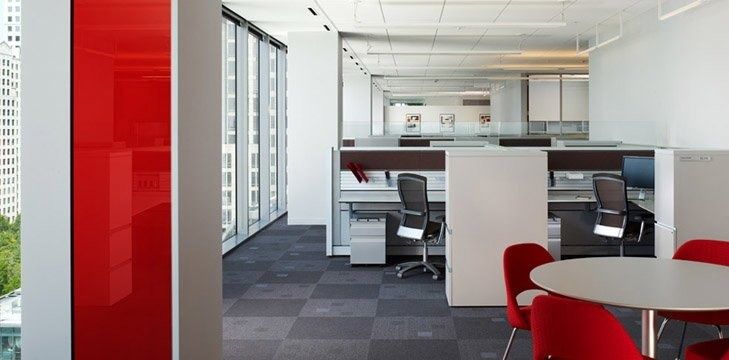Bank of America: Open work floor with red chairs