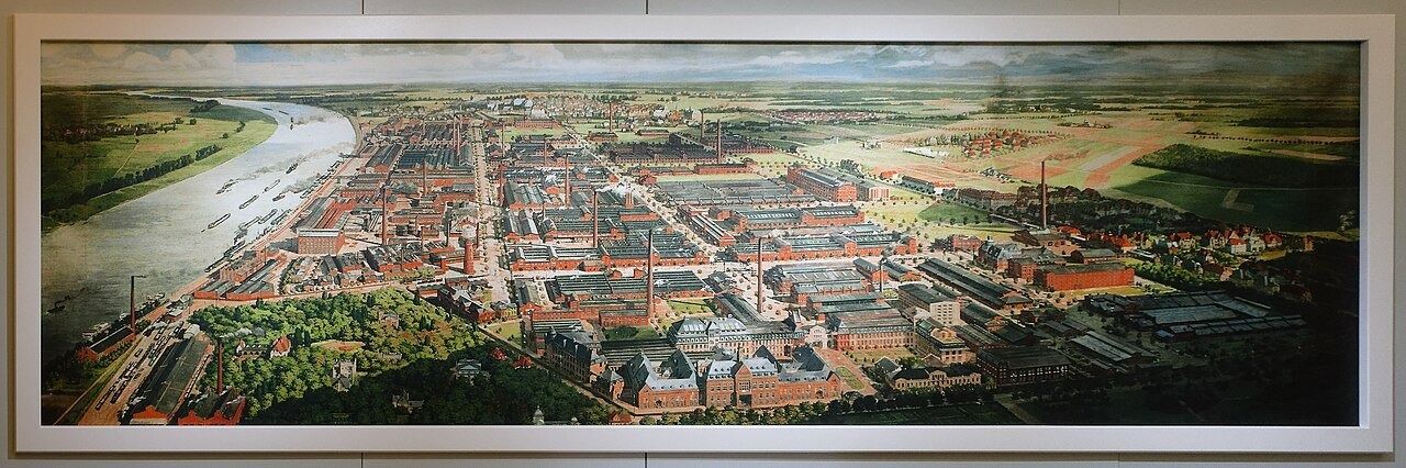 Wide painted panorama of a factory town by the Rhine