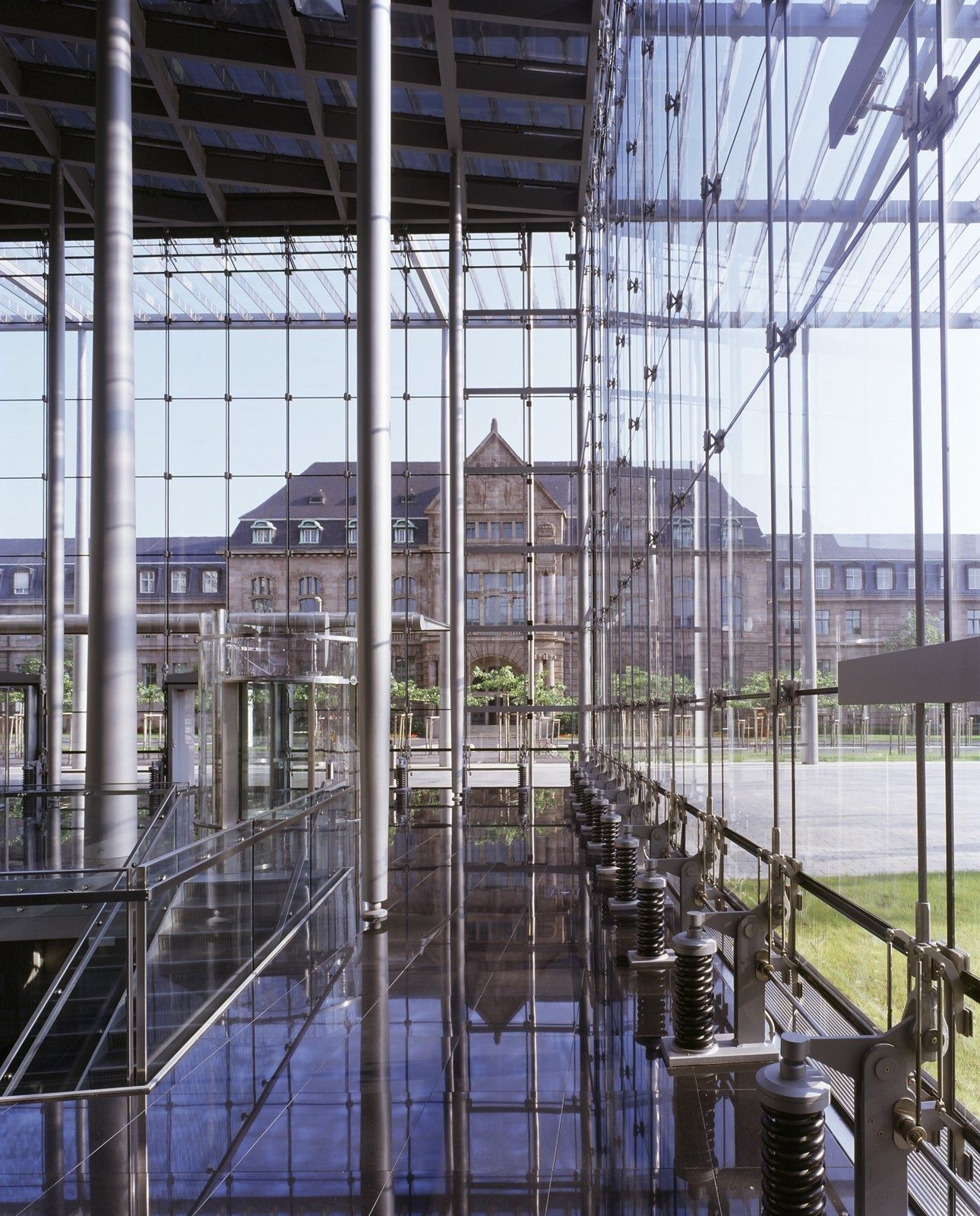 Bayer: Interior façade layers with a view to a historic building