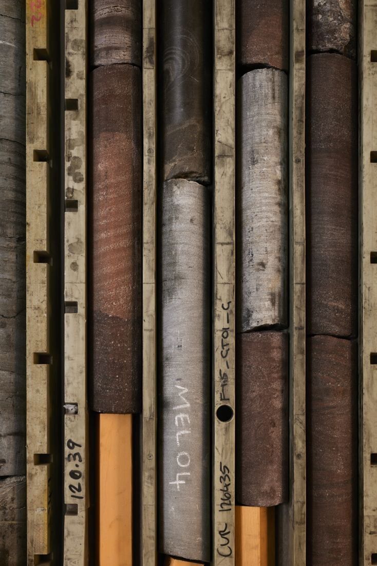 BHP: Close view of a row of cylindrical rock core samples