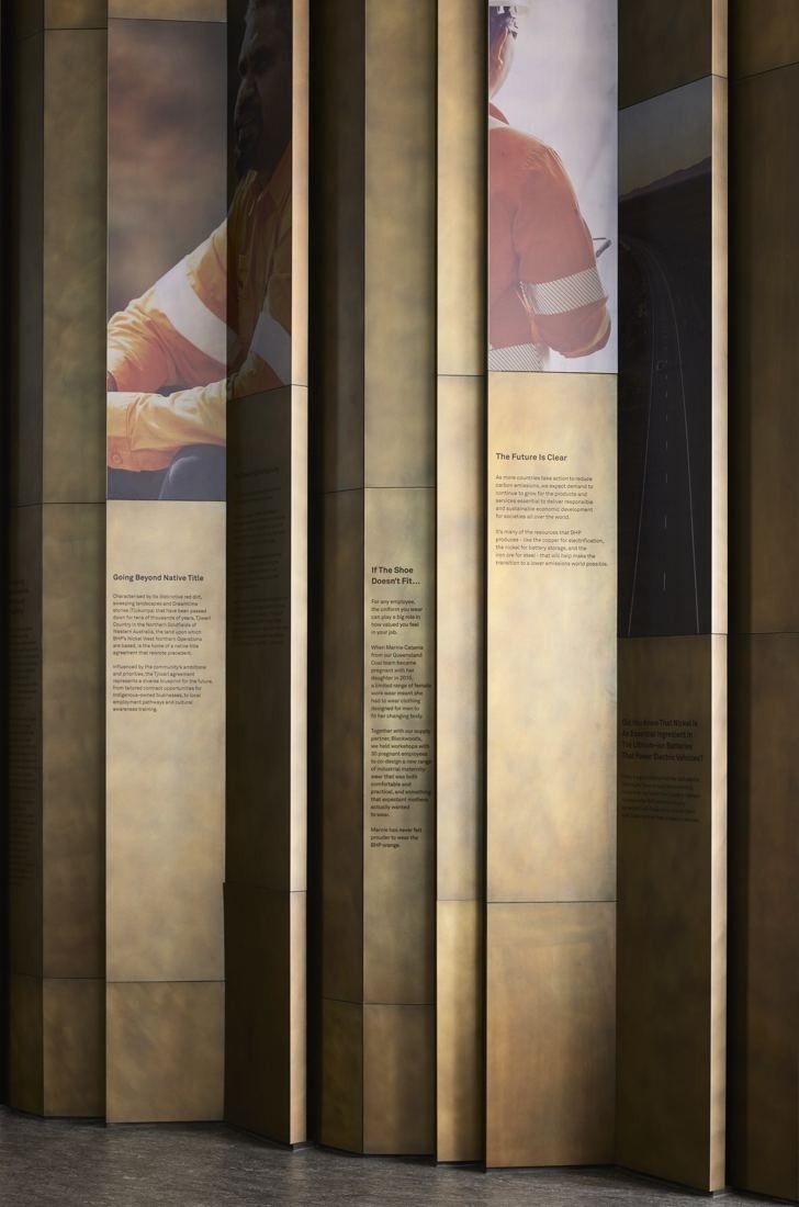 BHP: Tall folded panels printed with earthy imagery and text