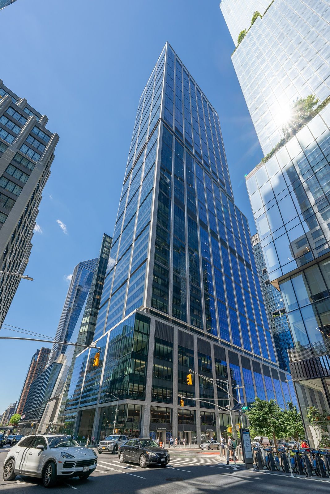BlackRock: Dark glass tower above a street corner