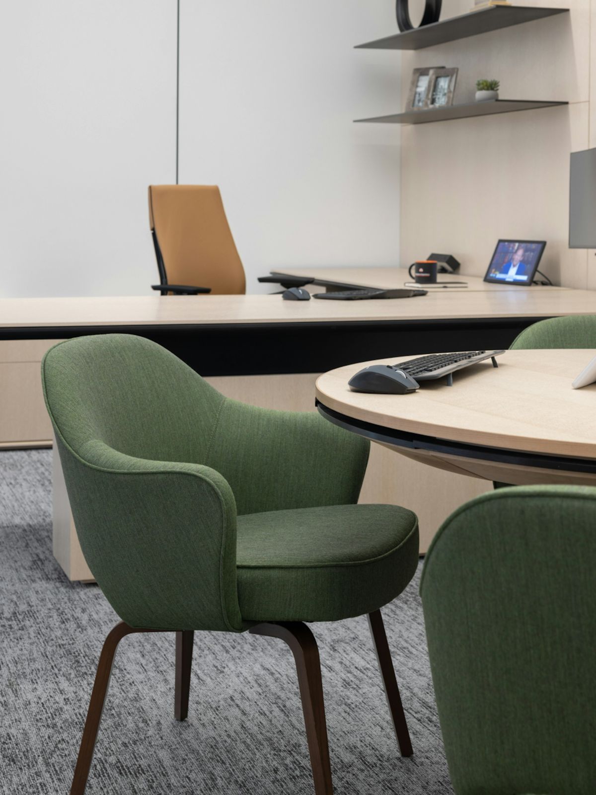 BlackRock: Meeting table with green chairs