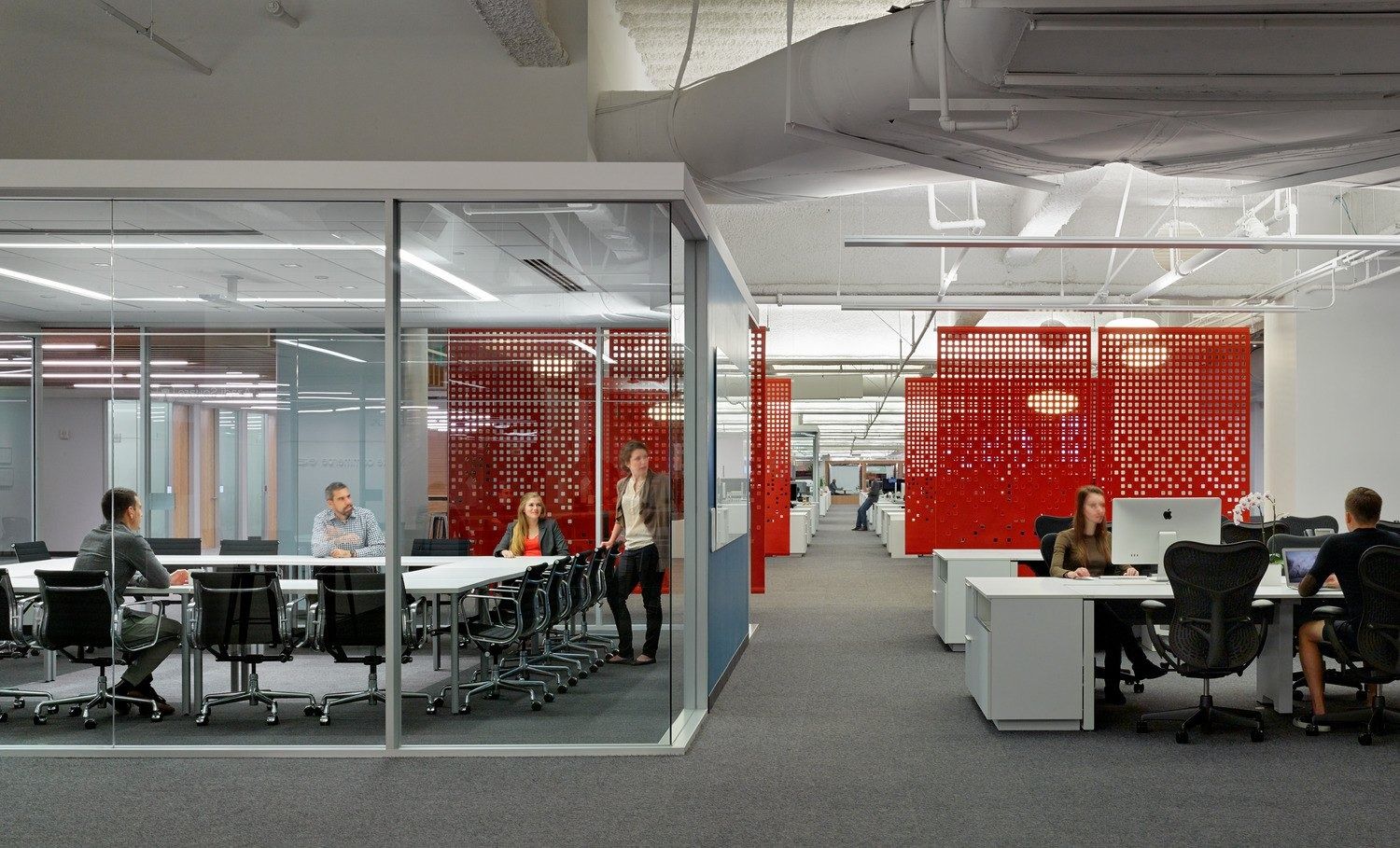 Block: Glass meeting rooms with red screens