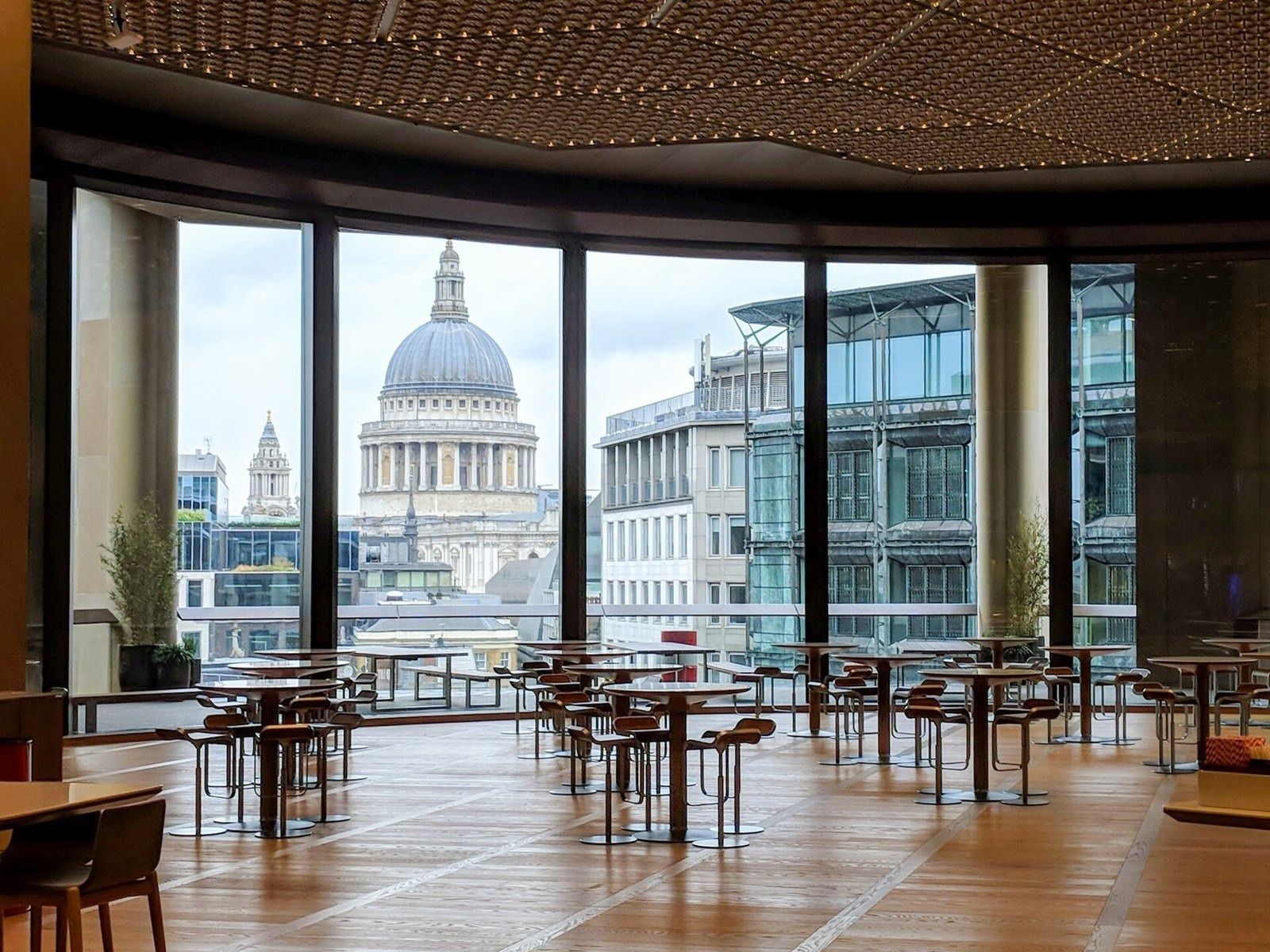 Bloomberg: A pantry with tables and a window view of St Paul's Cathedral