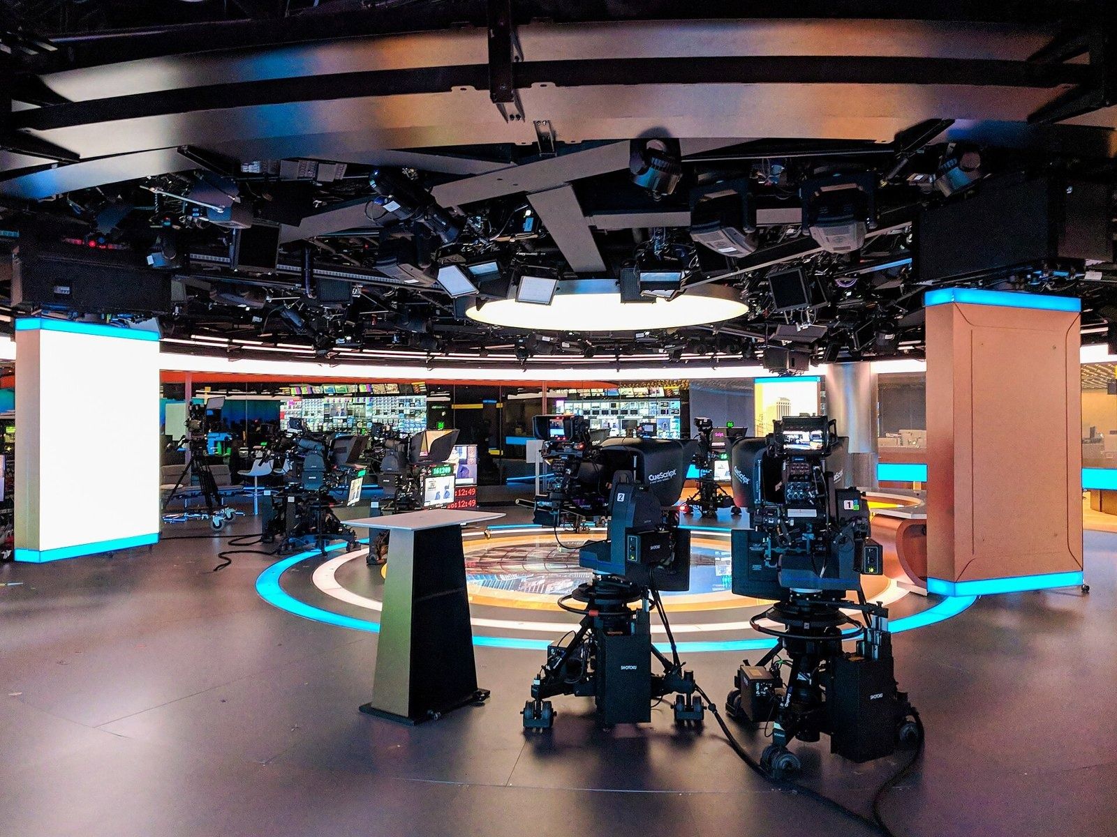 Bloomberg: A TV studio set with cameras