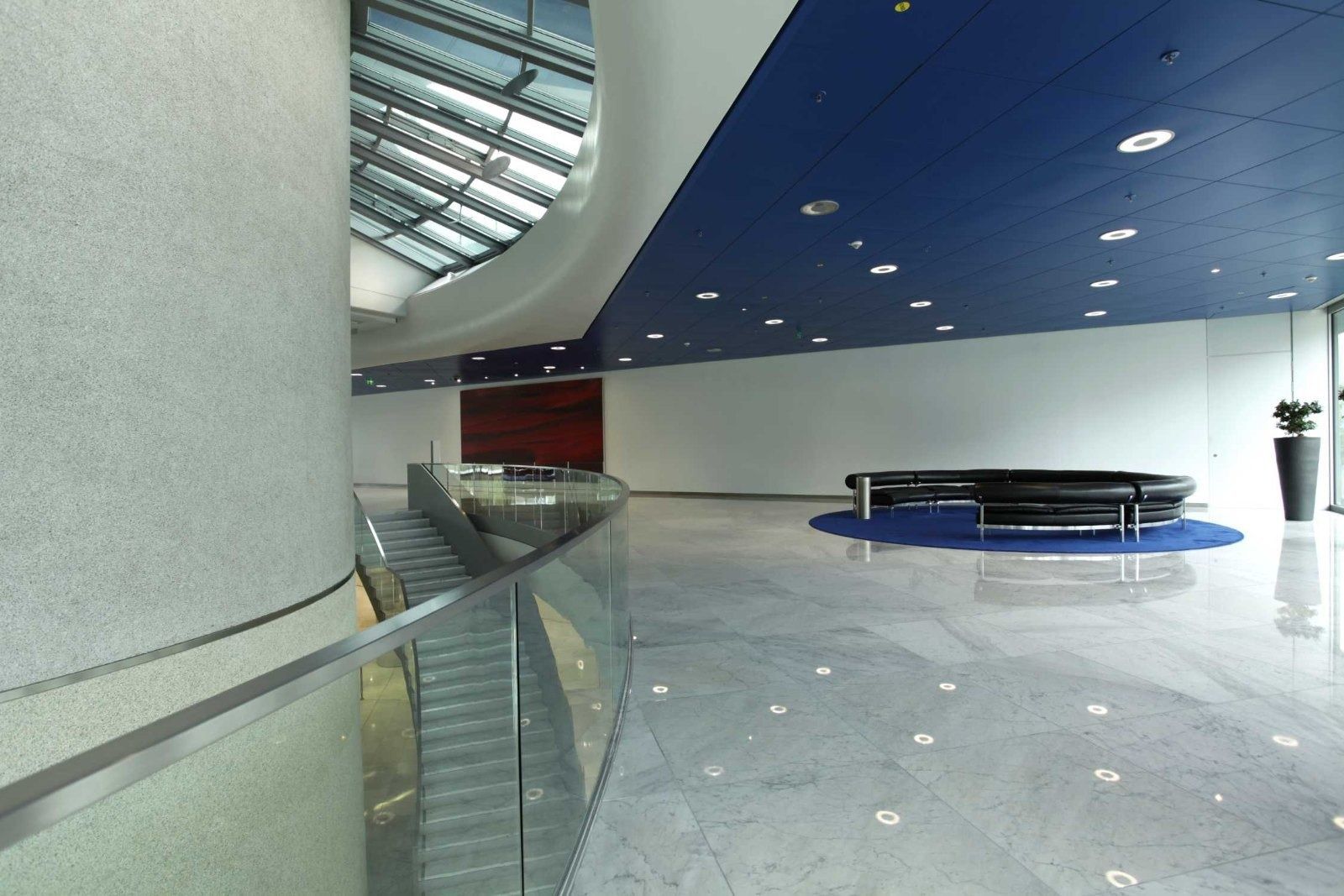 BMW Group: Lobby with a glass rail and blue rug