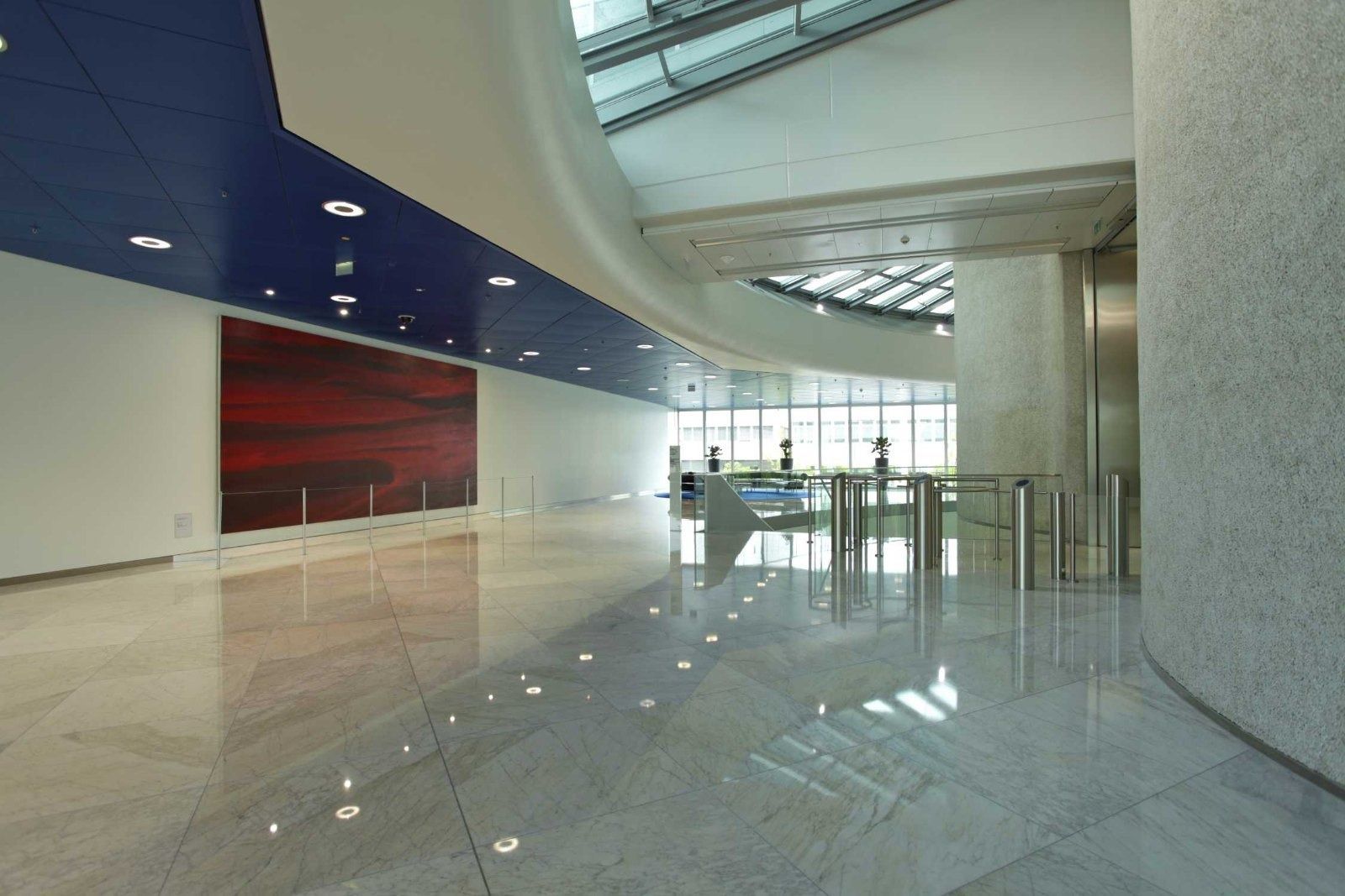 BMW Group: Lobby with turnstiles and a red painting