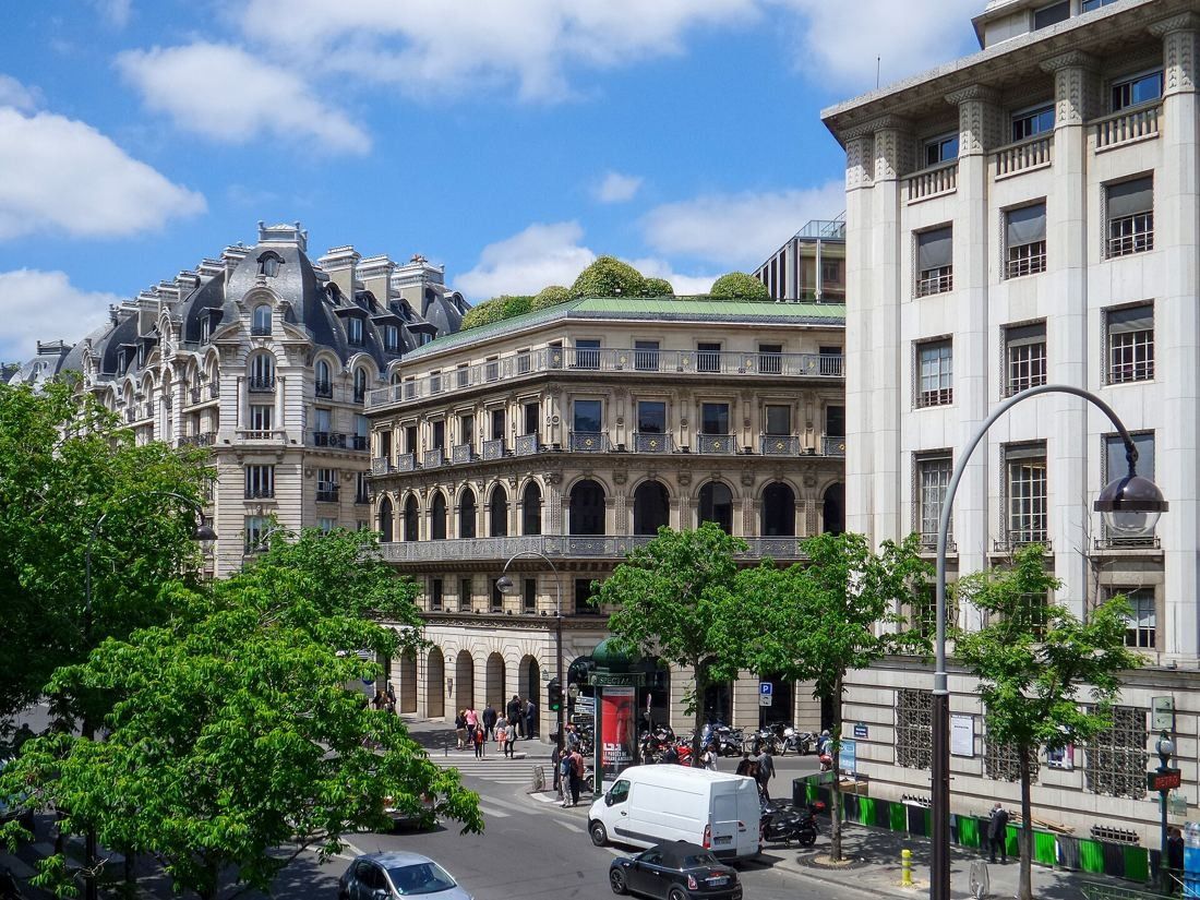 BNP Paribas: Boulevard crossing with ornate buildings, and the pilasters of the head office on the right