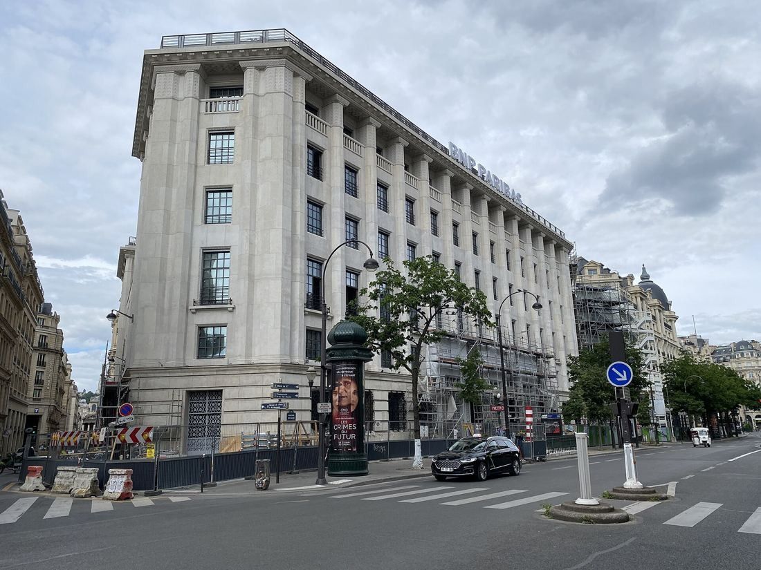 BNP Paribas: Corner of the stone head office building with scaffolding along the boulevard side