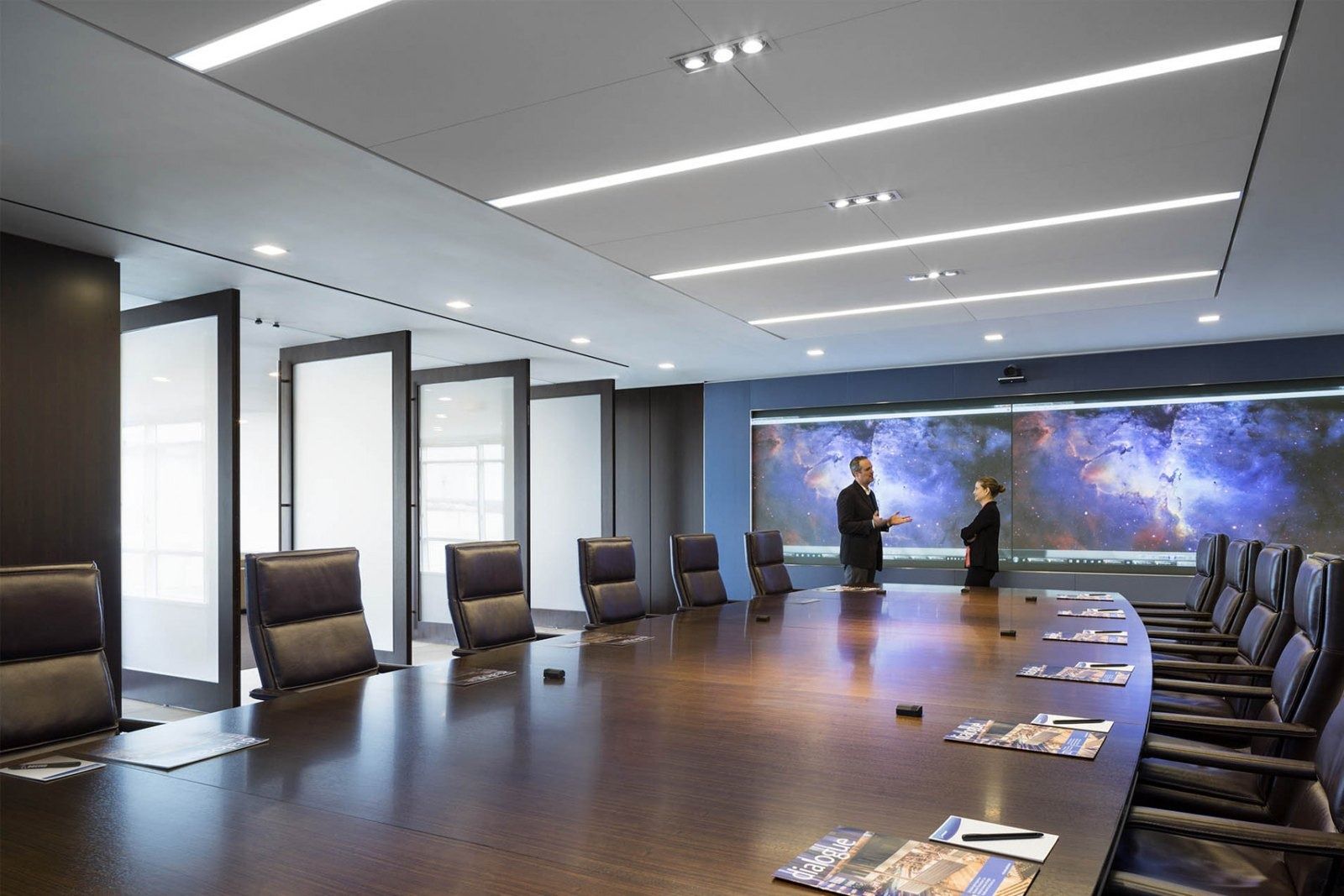 Boeing: Long boardroom table under a starfield screen