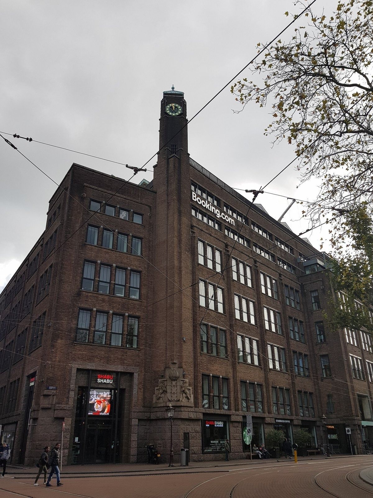 Brick office building with a clock tower on Rembrandtplein