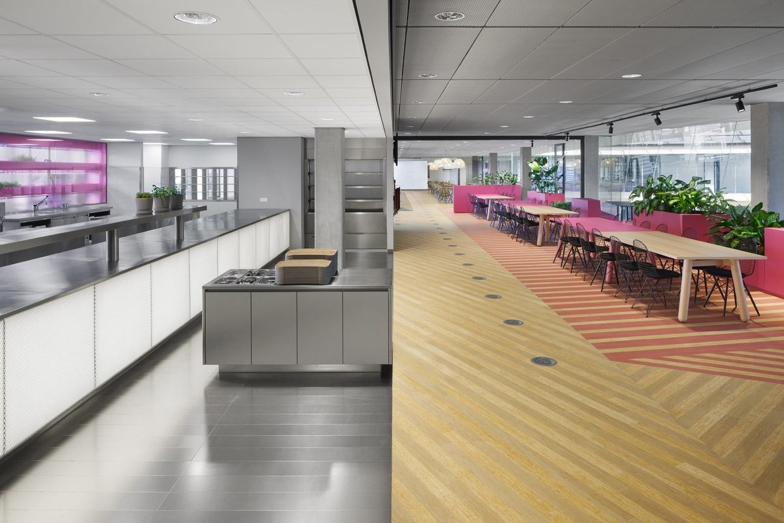Booking Holdings: Open kitchen counters next to dining tables on a striped floor