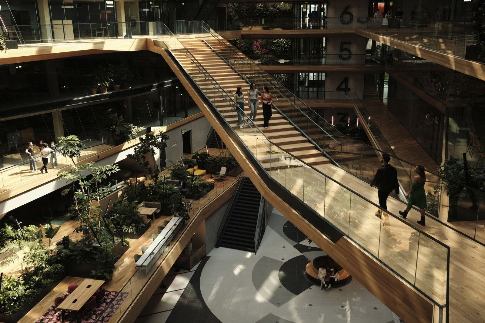Booking Holdings: Wide timber stair running down through planted terraces