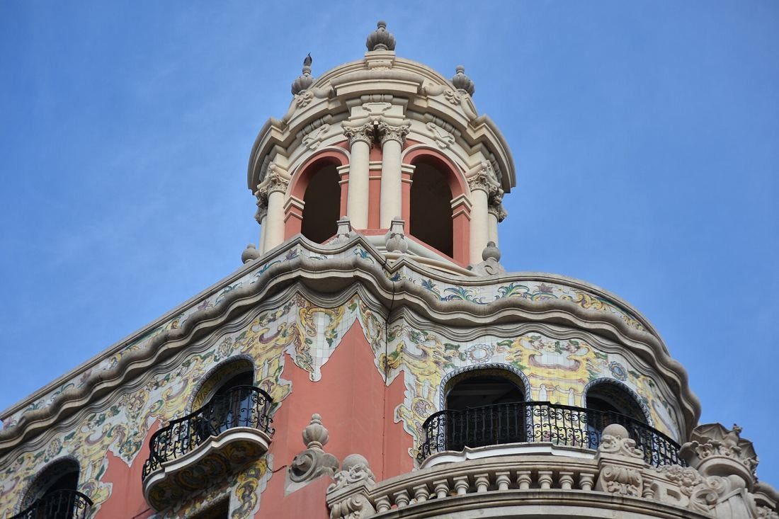 CaixaBank: Close view of the domed lantern above ornate balconies