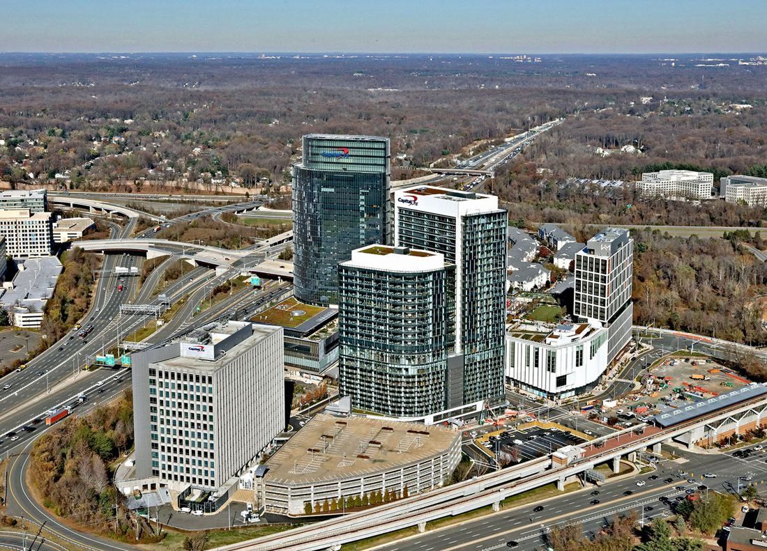 Capital One: Aerial view of several towers at a highway interchange